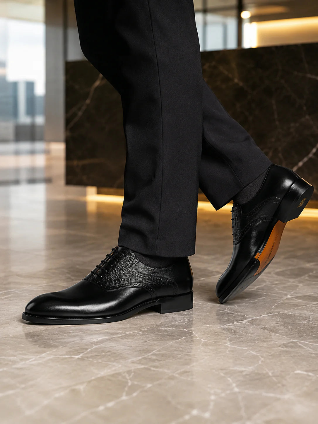 Rossanti black leather formal shoes styled with tailored trousers for a refined business look