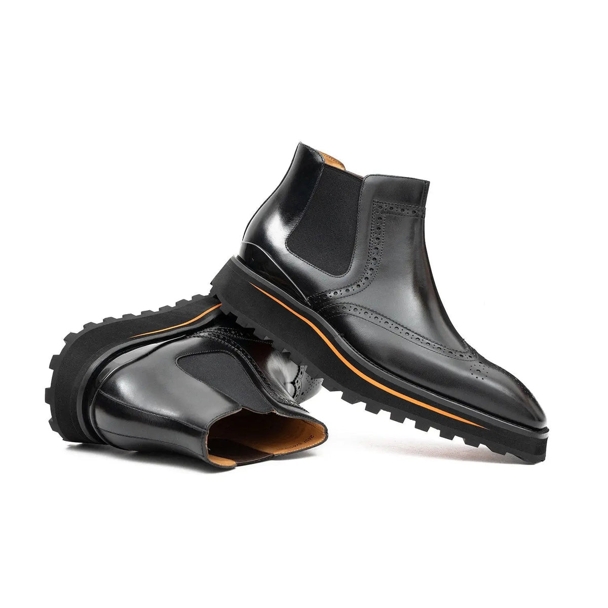 Black Wingtip Chelsea Boot